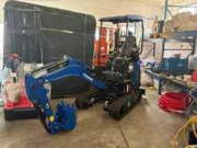 Online auction Graafmachine, stapelaars, aircos, diverse bouwmaterialen