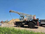 Online auction Torenkraan, verreiker, stuwboot, werfketens en bouwmaterialen